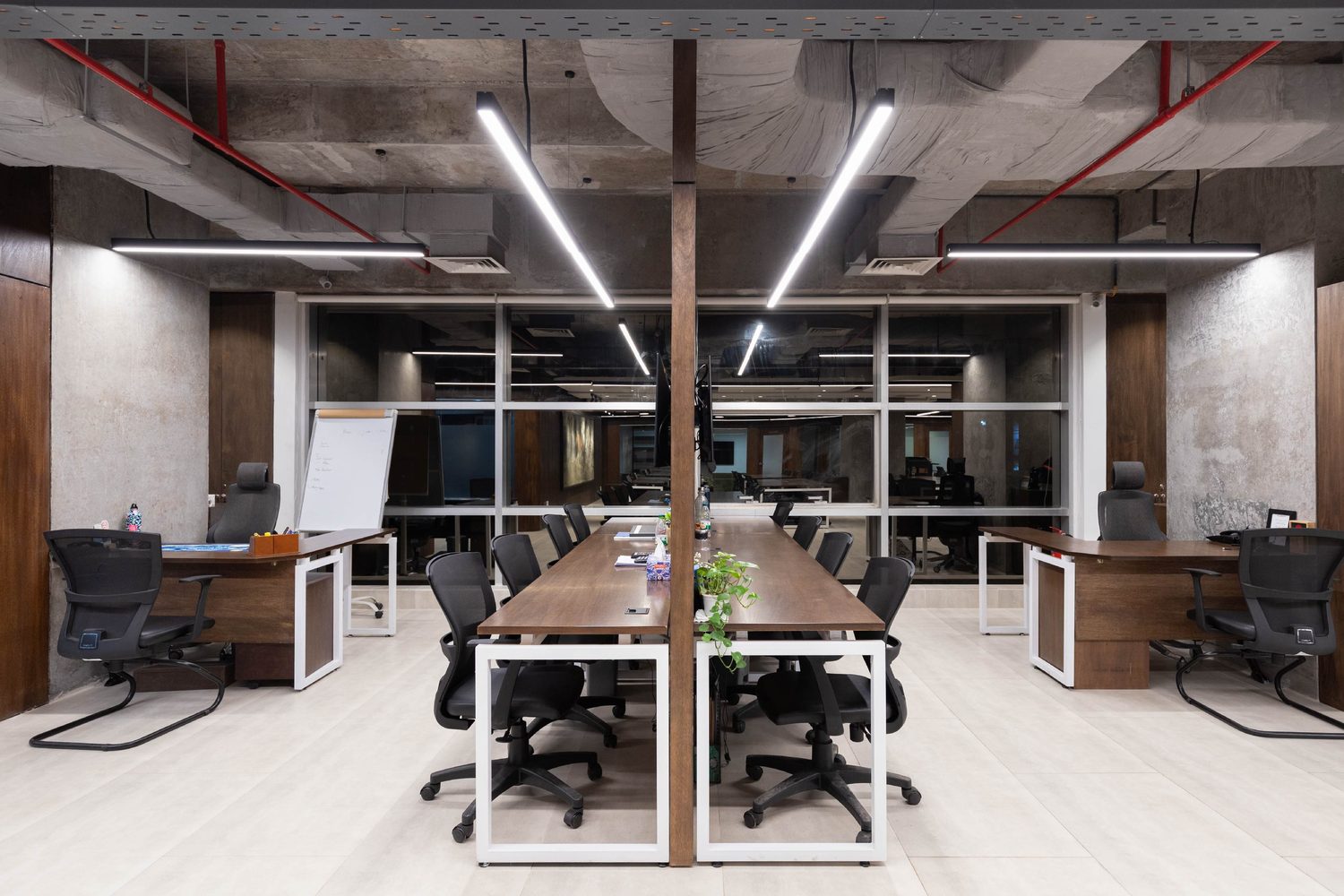 Confidence Group head office corporate interior design Karwanbazar Dhaka Bangladesh by REINCARNATION — workstations beneath linear lighting