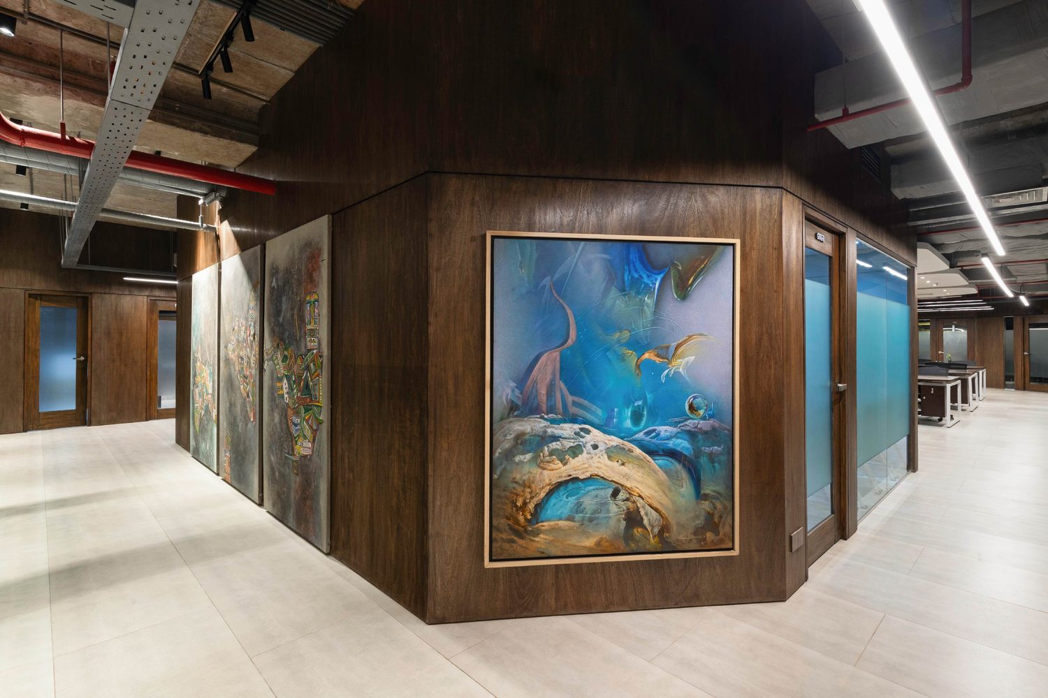 Confidence Group head office corporate interior design Karwanbazar Dhaka Bangladesh by REINCARNATION — art wall at the corridor turn